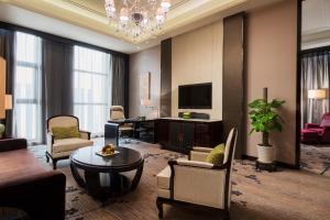 TV a/nebo společenská místnost v ubytování Wanda Realm Nanjing