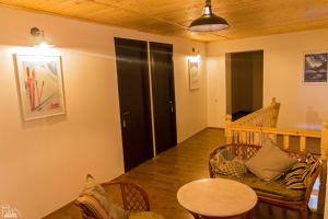 Area soggiorno di Becho House