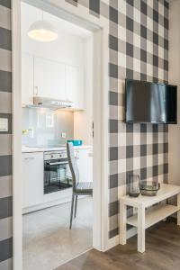 Kuchnia lub aneks kuchenny w obiekcie Apartment Dąbrowskiego by The Railway Station Wroclaw