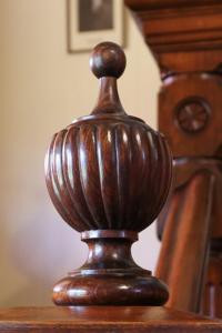 a wooden vase sitting on top of a table at Penghana Bed and Breakfast in Queenstown