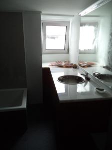 Virtuvė arba virtuvėlė apgyvendinimo įstaigoje Casa Comprida