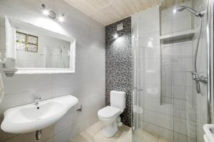 Kúpeľňa v ubytovaní Apartamenty Łozówka