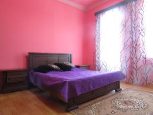 Postel nebo postele na pokoji v ubytování Joni Guest House
