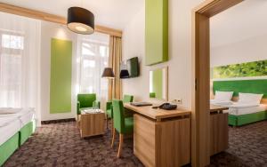 Łóżko lub łóżka w pokoju w obiekcie Cottonina Hotel & Mineral SPA Resort
