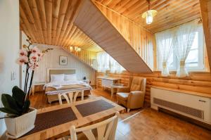 Posedenie v ubytovaní Apartamenty Łozówka