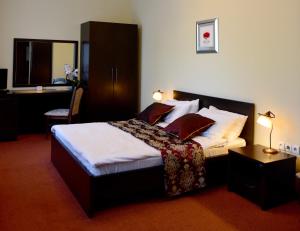 En eller flere senge i et værelse på Nurtau