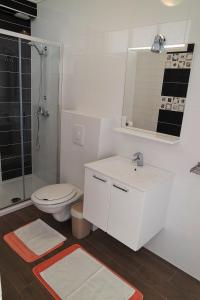 Koupelna v ubytování Lenka Apartments I