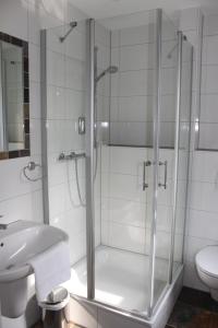 Koupelna v ubytování Hotel Tau-Lünne