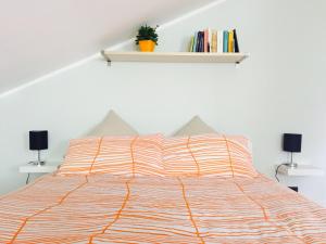 Posteľ alebo postele v izbe v ubytovaní Appartamento Cretaz