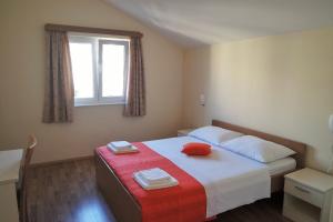 Postel nebo postele na pokoji v ubytování Lenka Apartments I
