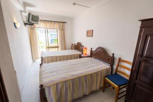 Postel nebo postele na pokoji v ubytování Guesthouse A Lareira