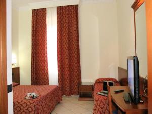 TV a/nebo společenská místnost v ubytování Hotel Mirage