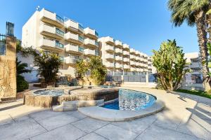 a swimming pool in front of a apartment building at Espanhouse La Zenia 109 in Orihuela Costa