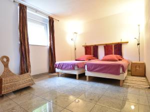 Cama o camas de una habitación en Quaint Holiday Home in Varsberg with Terrace