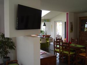 A television and/or entertainment centre at Maison Marguerite