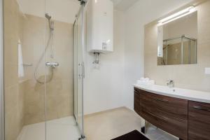 Koupelna v ubytování Konrad-Haus - DorfResort Mitterbach + 21 fotografií
