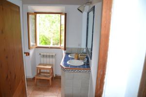 Koupelna v ubytování Es Campet, charmante finca, Soller, Vue splendide, piscine, calme