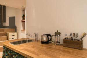 Kjøkken eller kjøkkenkrok på Saint Claire Studio