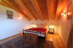 Tempat tidur dalam kamar di Chalet Du Mont