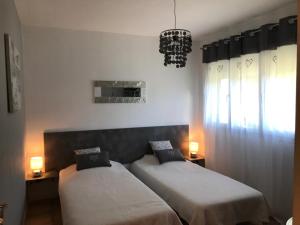 Postel nebo postele na pokoji v ubytování Chambre d'hôtes Costa Belle