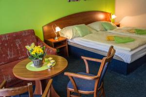 Voodi või voodid majutusasutuse Hotel Centrum Harrachov toas