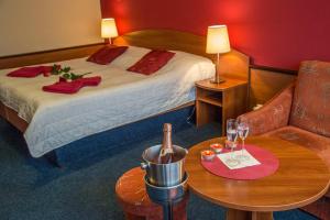 Voodi või voodid majutusasutuse Hotel Centrum Harrachov toas
