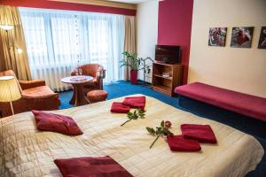Voodi või voodid majutusasutuse Hotel Centrum Harrachov toas