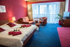Voodi või voodid majutusasutuse Hotel Centrum Harrachov toas