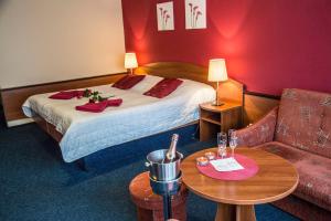 Voodi või voodid majutusasutuse Hotel Centrum Harrachov toas