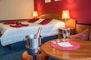 Voodi või voodid majutusasutuse Hotel Centrum Harrachov toas