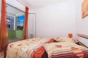 Posteľ alebo postele v izbe v ubytovaní Apartments Braco