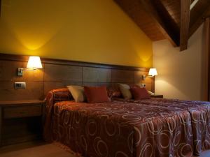 a bedroom with a large bed in a room at Hotel Casa Chuldian in Sahun +20 photos