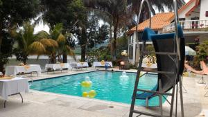 Bazén v ubytování Cabaña en Prado Tolima nebo v jeho okolí + 17 fotografií