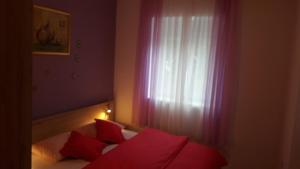 Postel nebo postele na pokoji v ubytování Apartments A&A + 31 fotografií