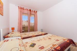 Posteľ alebo postele v izbe v ubytovaní Apartments Braco