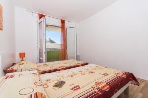 Posteľ alebo postele v izbe v ubytovaní Apartments Braco
