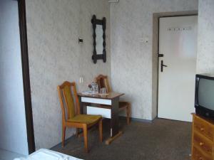 Telewizja i/lub zestaw kina domowego w obiekcie Karet Obiekt Hotelowy