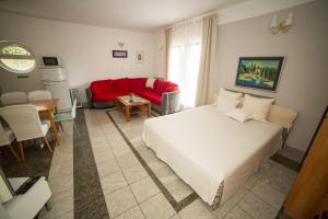 Postel nebo postele na pokoji v ubytování Apartments Villa Majda