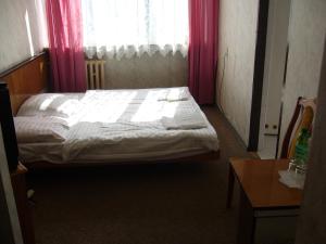 Łóżko lub łóżka w pokoju w obiekcie Karet Obiekt Hotelowy