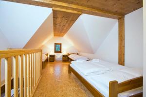 Postel nebo postele na pokoji v ubytování Apartmány Udatný