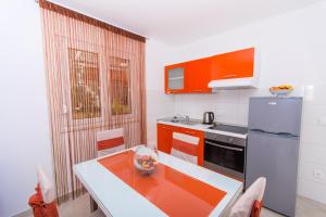 Kuchyňa alebo kuchynka v ubytovaní Apartments Braco