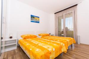 Posteľ alebo postele v izbe v ubytovaní Apartments Braco
