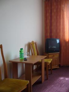 Telewizja i/lub zestaw kina domowego w obiekcie Karet Obiekt Hotelowy
