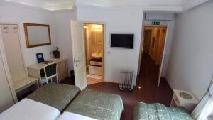 TV a/nebo společenská místnost v ubytování Guest House Šterk