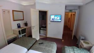 TV a/nebo společenská místnost v ubytování Guest House Šterk