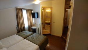 Postel nebo postele na pokoji v ubytování Guest House Šterk
