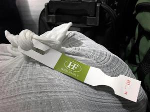 a person wearing a glove holding a knife at Hotel Family São Paulo - No Shopping FAMILY - No Brás in São Paulo