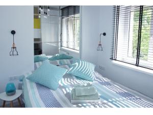 Posteľ alebo postele v izbe v ubytovaní Nowolipie Warsaw Apartment
