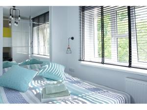 Posteľ alebo postele v izbe v ubytovaní Nowolipie Warsaw Apartment