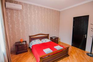 Postel nebo postele na pokoji v ubytování Dima's Guesthouse
